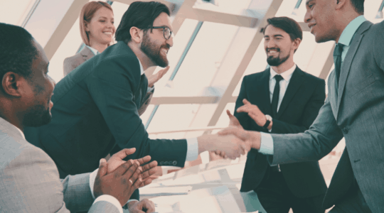 business-group-shaking-hands-clapping